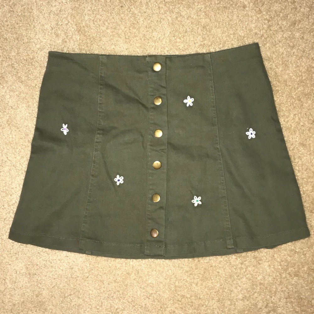 White Crow mini skirt with stitched daisy detail